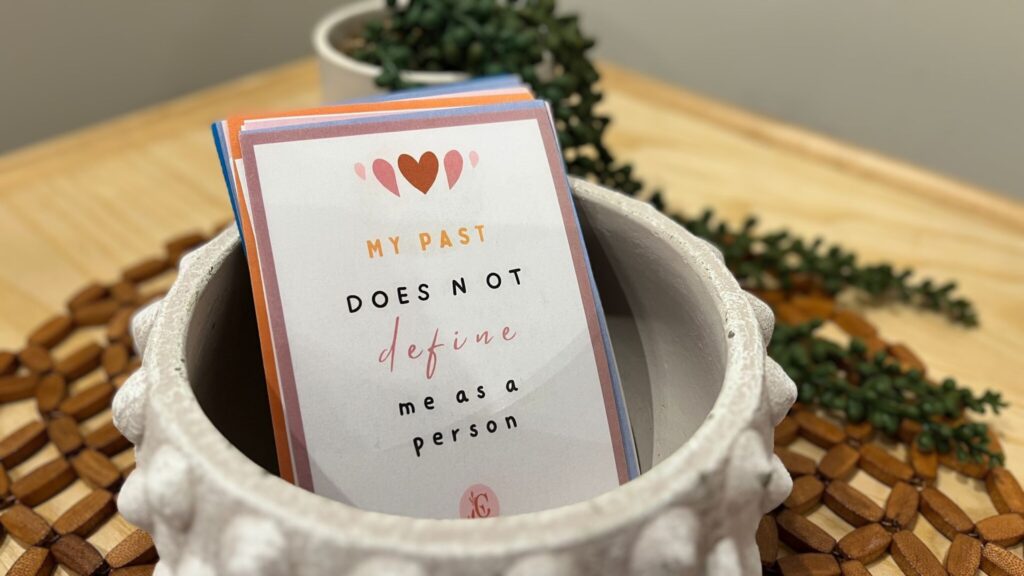 A card reading: "My past does not define me as a person".